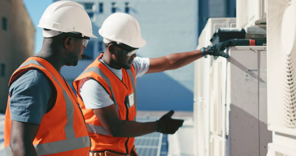 Electricians and Tradesmen Working